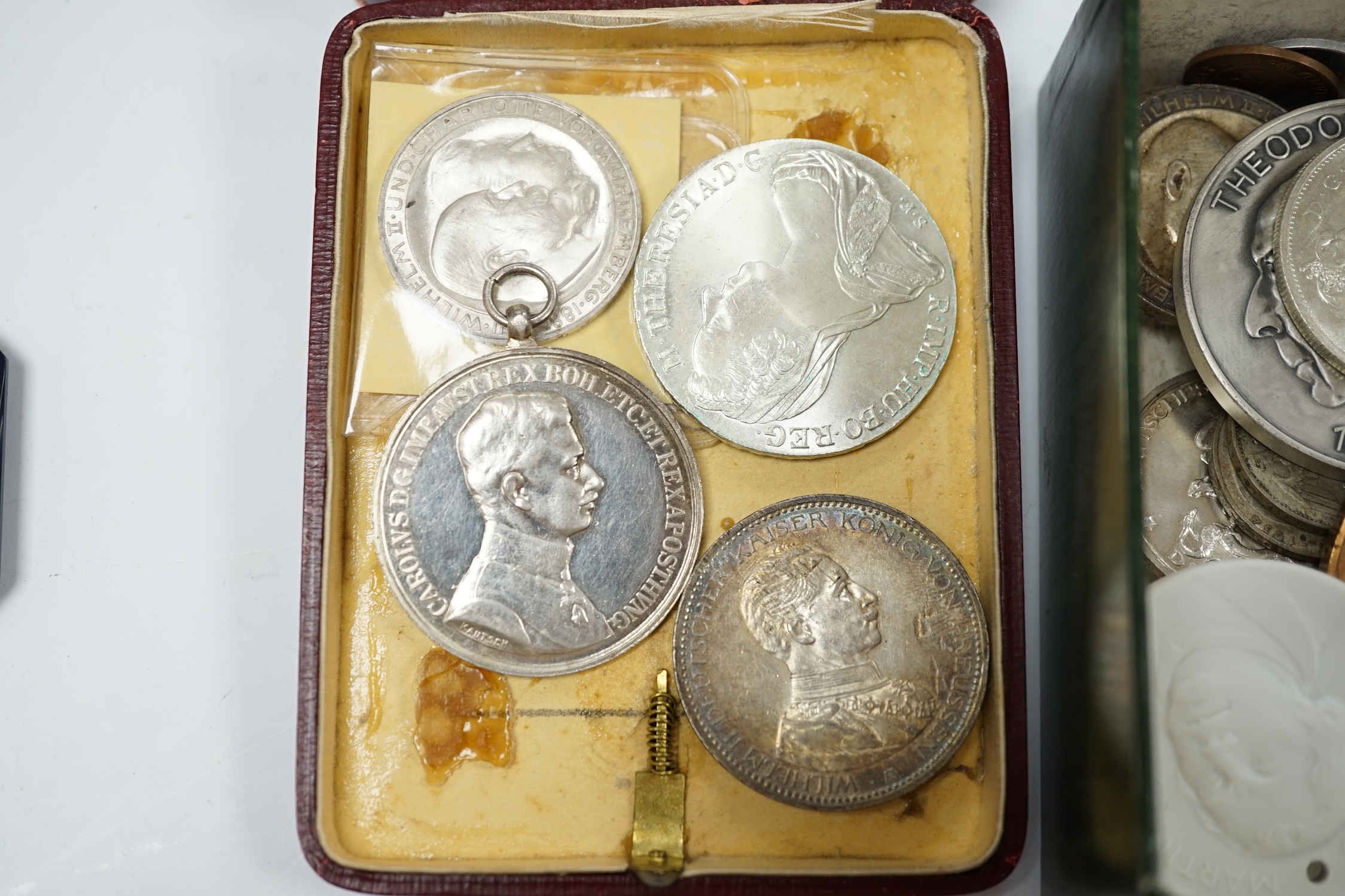 German and world coins, to include Württemberg Three Marks 1911, Prussia five marks 1914 etc., together with a Meissen biscuit porcelain Martin Luther commemorative medallion and two small boxes of coins. Condition - var